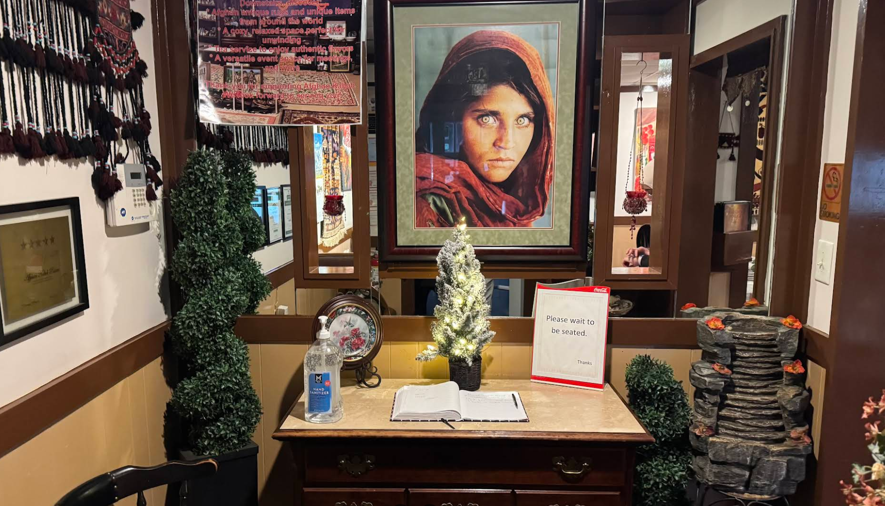 Afghan Kabob Palace host stand with traditional decor